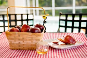 apples and honey on a table