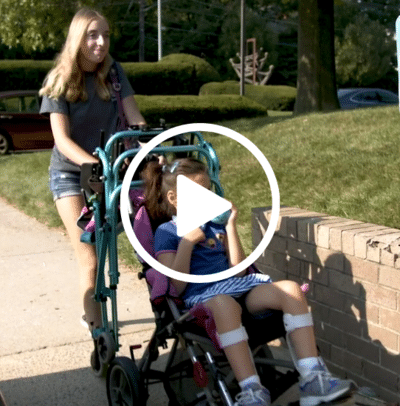 Video thumbnail of camp counselor pushing child with disabilities in stroller